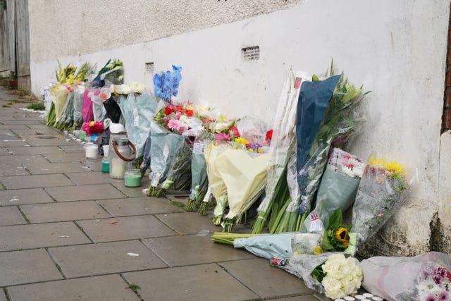 Flowers left at the scene in Kirkstall Gardens, Streatham Hill, south London