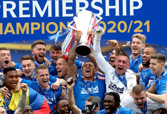 Rangers collected the Premiership trophy inside an empty Ibrox