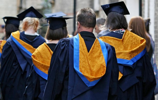 Students in their graduation robes and mortarboards