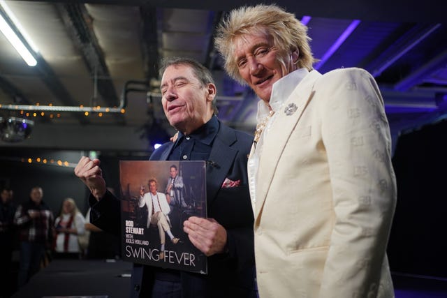 Rod Stewart and Jools Holland album signing