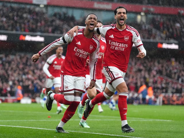 Ezri Konsa (left) celebrates