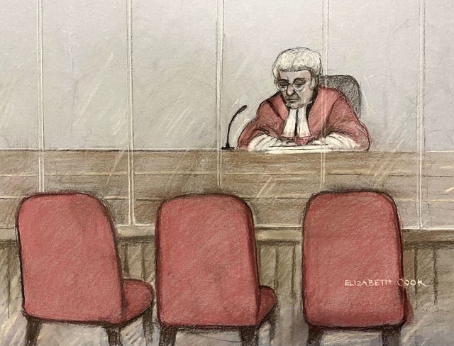 A sketch of empty chairs in court
