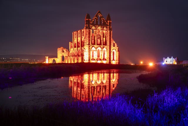 Lights illuminate the ruins of Whitby Abbey in North Yorkshire to mark Halloween