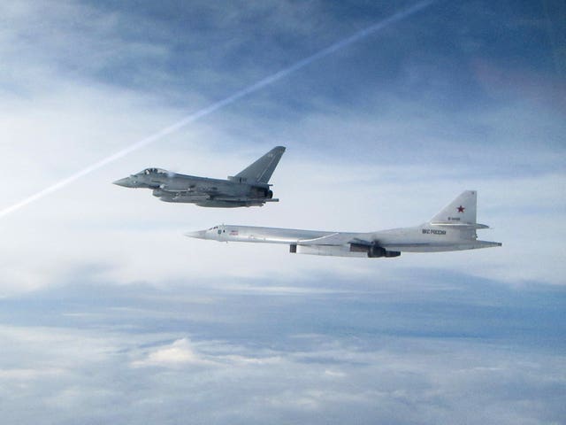 An RAF fighter jet intercepting a Russian military aircraft approaching a UK area of interest (Ministry of Defence/Crown Copyright/PA)