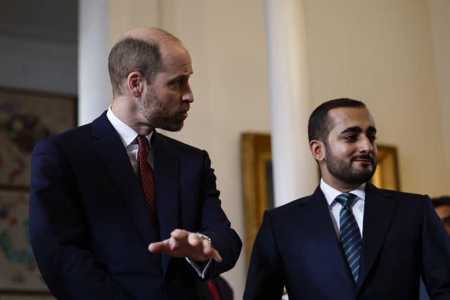 The Prince of Wales (left) and Theyazin bin Haitham stand together