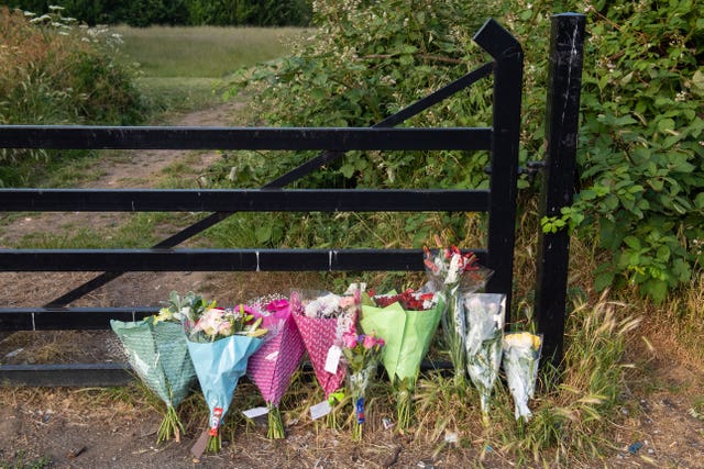 Flowers at an entrance to Fryent Country Park following the murder