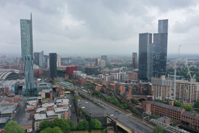 A view from height of Manchester city centre under grey skies
