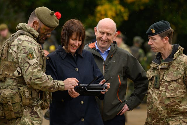 Rachel Reeves operates a Max Evo drone as Defence Secretary John Healey looks on