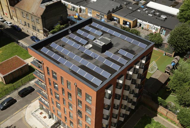 Solar panels on the roof of an apartment block in Bethnal Green, east London. 