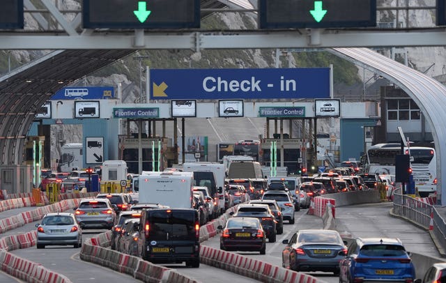 Cars queue at check-in to board ferries at the Port of Dover in Kent