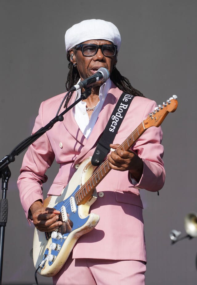 Nile Rodgers performing on stage