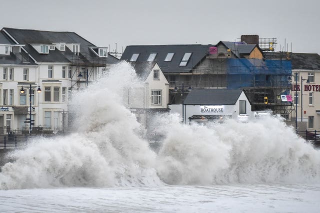 Huge waves hit the sea wall in Porthcawl, Wales, amid hazardous conditions (Ben Birchall/PA)