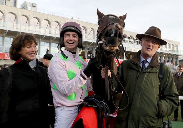 Patrick Mullins with his father Willie Mullins and his mother Jackie Mullins 