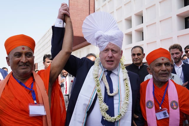 Prime Minister Boris Johnson wearing a turban during a visit to Gujarat University of Biotechnology, Gandhinagar, Gujarat, as part of his two-day trip to India
