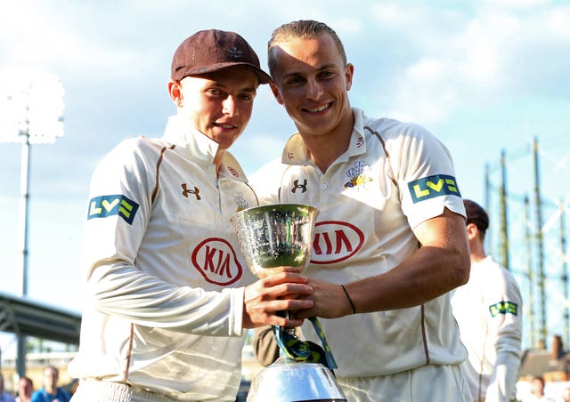 Sam (left) and Tom (right) celebrate with Surrey.