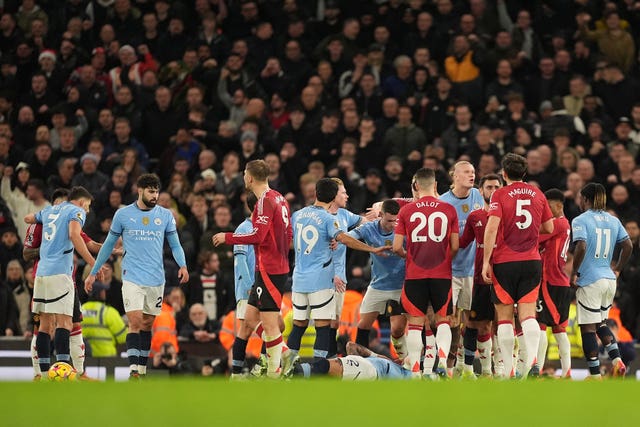 Kyle Walker lies on the floor as tempers boil over