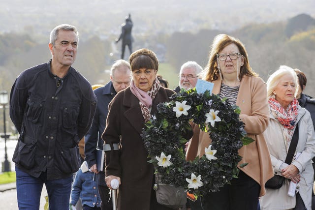 Northern Ireland actor James Nesbitt, left, takes part in a silent walk with the families of the Disappeared