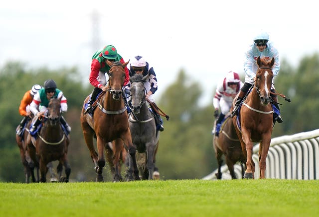 Aplha Cru ridden by jockey David Nolan (right) wins the Happy Retirement Mick Henshaw Novice Stakes at Pontefract