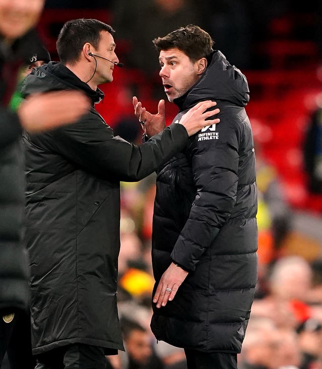 Chelsea manager Mauricio Pochettino, right, protests to fourth official Andy madley during the Premier League defeat to Liverpool at Anfield