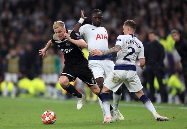 Donny Van De Beek (left) and Kieran Trippier battle for the ball