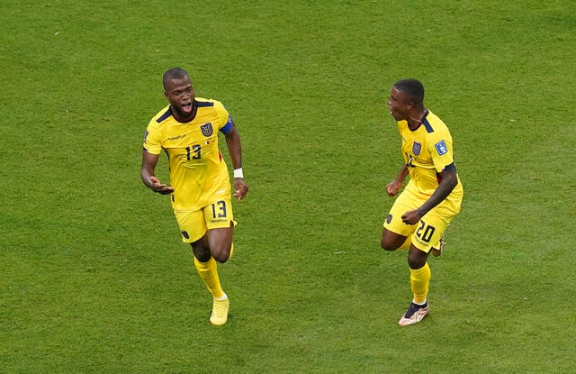 Enner Valencia (left) celebrates scoring against Qatar