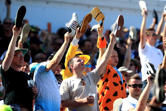 England fans show support for Ben Stokes by lifting their shoes up during day four of the third Ashes Test at Headingley