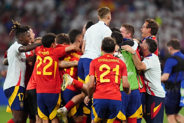 Spain celebrate their semi-final win against France
