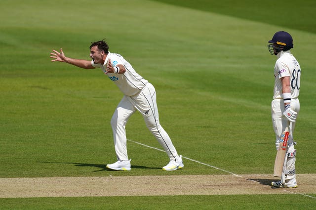 Tim Southee appeals successfully for the wicket of Ollie Pope, right