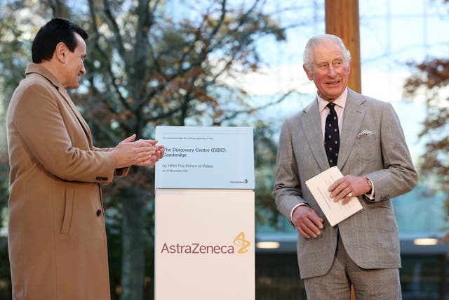 The Prince of Wales (right) unveils a plaque with AstraZeneca's Pascal Soriot 