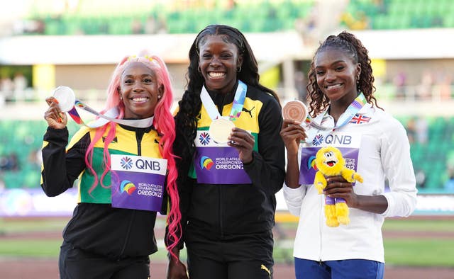 Shelly-Ann Fraser-Pryce, Shericka Jackson and Dina Asher-Smith, left to right, on the 200m podium at last year's World Championships