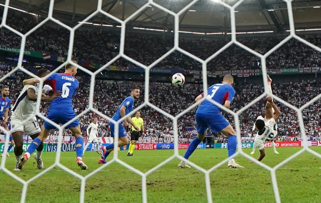 England’s Jude Bellingham scores against Slovakia at Euro 2024