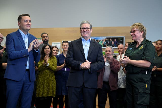 Sir Keir Starmer, Wes Streeting and London Ambulance Service chief paramedic Pauline Cranmer at an event in east London 