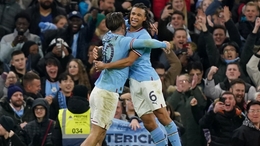 Manchester City’s Nathan Ake (right) and Jack Grealish celebrate (Mike Egerton/PA).