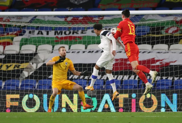 Kieffer Moore scores Wales' third to kill off the tie