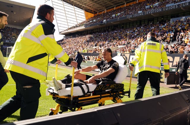 Xavi Simons is taken off on a stretcher