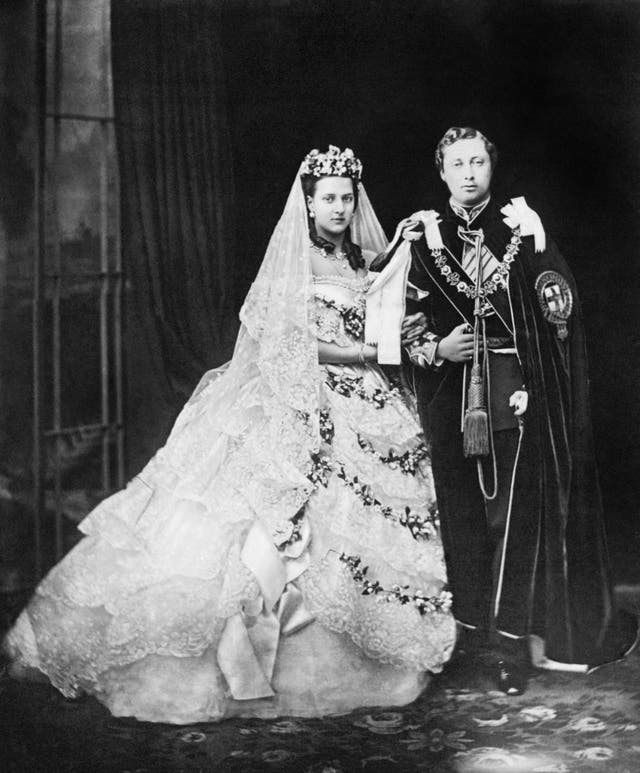 Edward, Prince of Wales, later King Edward VII, and his bride, Princess Alexandra of Denmark, after their wedding (PA)