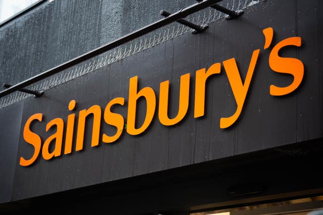 A Sainsbury&rsquo;s logo on a storefront
