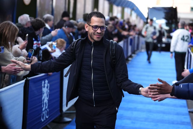 Chelsea manager Liam Rosenior greets fans