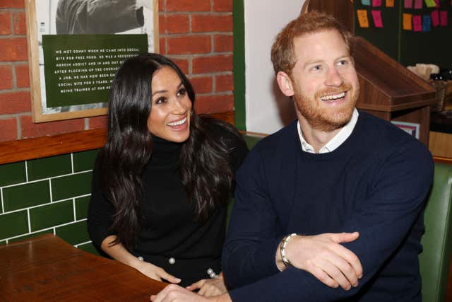 Prince Harry and Meghan Markle during a visit to Social Bite in Edinburgh (Owen Humphreys/PA)