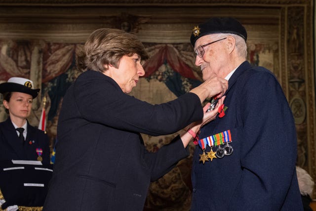 French ambassador to the UK Catherine Colonna presents William Allen with the Legion d’Honneur, during a ceremony at the French Ambassador’s residence in Kensington Gardens, London