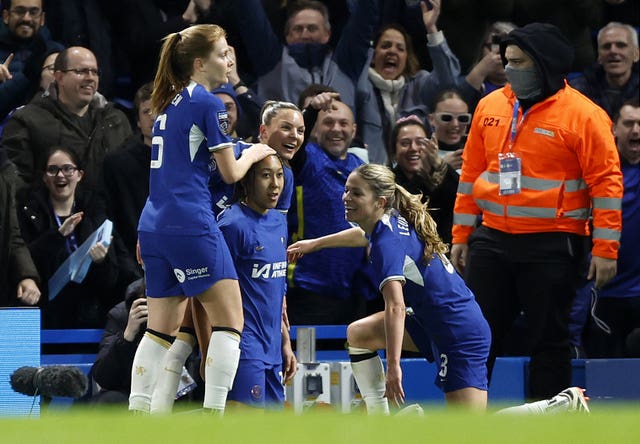 Chelsea’s Lauren James (centre left) celebrates as they maintained their place at the top of the Women's Super League with a 3-1 win over title rivals Arsenal