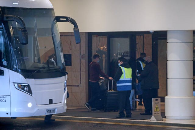 A coach delivers passengers to the Radisson Blu Edwardian Hotel