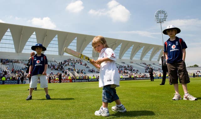 England captain Michael Vaughan’s son Archie plays on the outfield at Trent Bridge in June 2008