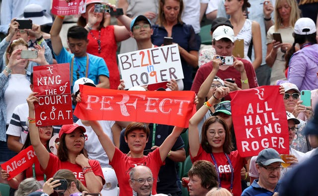 Roger Federer fans in the crowd on Centre Court