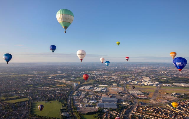 Hot air balloons over Bristo