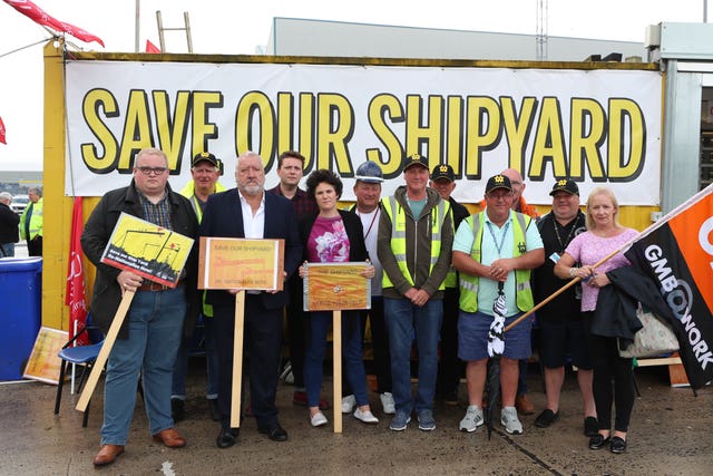 SDLP politicians Seamus de Faoite (far left), Pat Catney (third left), Claire Hanna (centre) and Denise Walker from the GMB (far right) supporting the Harland and Wolff workers