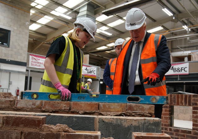 Boris Johnson lays bricks