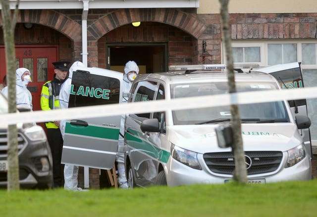 Police at the scene of the deaths