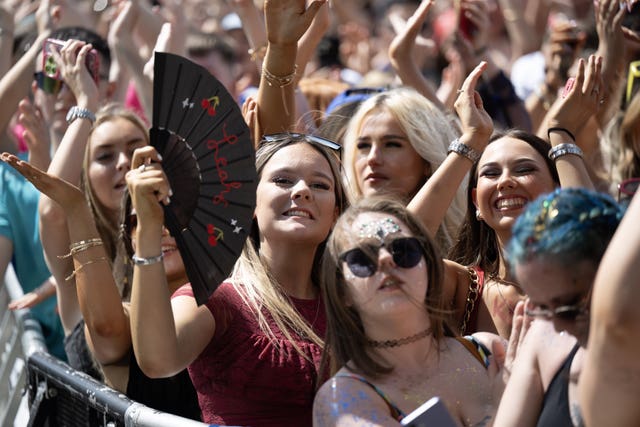 Fans with fans: Revellers watch James Bay perform on stage at the Trnsmt Festival in Glasgow on Friday afternoon