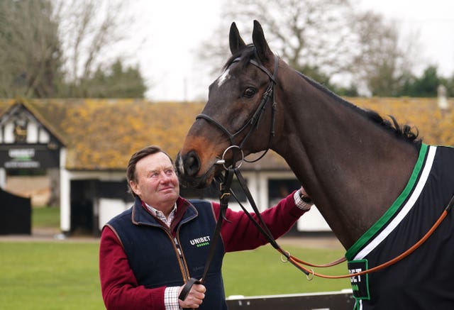 Trainer Nicky Henderson and Shishkin during a visit to Nicky Henderson’s stables at Seven Barrows in Lambourn